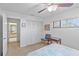 Comfortable bedroom featuring a closet, soft lighting, and neutral colors at 5310 Huntingwood Ct # 40, Sarasota, FL 34235