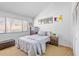Bedroom with natural light, vaulted ceilings, and neutral carpet at 5310 Huntingwood Ct # 40, Sarasota, FL 34235