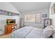Bright bedroom with natural light, vaulted ceilings, and carpet at 5310 Huntingwood Ct # 40, Sarasota, FL 34235