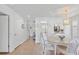 Open dining area with a view of the kitchen, perfect for entertaining and everyday living at 5310 Huntingwood Ct # 40, Sarasota, FL 34235