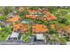 Charming condo community with well-manicured lawns, mature trees, and assigned parking at 5310 Huntingwood Ct # 40, Sarasota, FL 34235