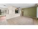 Bright and airy living room with tile flooring and an open layout to the kitchen at 5318 17Th N St, St Petersburg, FL 33714