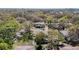 A scenic aerial view capturing the homes nestled amongst lush green foliage at 6218 Greenleaf Ln # 6218, Temple Terrace, FL 33617