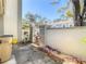 Enclosed patio space with potted plants, offering a private outdoor area at 6218 Greenleaf Ln # 6218, Temple Terrace, FL 33617