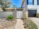 Charming home featuring a driveway and landscaped front yard at 6218 Greenleaf Ln # 6218, Temple Terrace, FL 33617