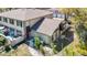 A charming exterior angle highlighting the back side of the property including the backyard, patio, and private courtyard at 6218 Greenleaf Ln # 6218, Temple Terrace, FL 33617