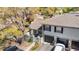 Charming townhome with two-car garage, neutral paint, and welcoming gated front patio and lush landscaping at 6218 Greenleaf Ln # 6218, Temple Terrace, FL 33617