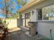 Well-maintained front yard, including a manicured lawn and decorative fence at 6218 Greenleaf Ln # 6218, Temple Terrace, FL 33617