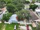 Birds eye view of home showing landscaping, neighboring homes, and a mature tree canopy at 8413 N Hamner Ave # A, Tampa, FL 33604