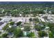 Overhead shot of street and neighborhood with commercial area, showcasing the area at 8413 N Hamner Ave # A, Tampa, FL 33604