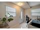 Well-lit office with tiled floors, desk, and windows at 8413 N Hamner Ave # A, Tampa, FL 33604