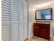 Bathroom featuring a vanity and closet at 10530 77Th Ter # 224, Seminole, FL 33772
