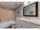 Bathroom featuring a vanity, toilet, and shower/bath at 10530 77Th Ter # 224, Seminole, FL 33772