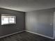 A blank bedroom with modern flooring and neutral walls provides a blank canvas at 10530 77Th Ter # 224, Seminole, FL 33772