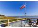 Deck overlooking a waterfront view, ideal for outdoor entertaining and enjoying picturesque scenery at 10530 77Th Ter # 224, Seminole, FL 33772