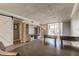 Open concept dining area with views of the living room, kitchen, and outdoor patio at 10530 77Th Ter # 224, Seminole, FL 33772