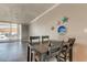 Dining room featuring starfish decorations, a sliding door to a patio, and wood floors at 10530 77Th Ter # 224, Seminole, FL 33772
