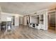 Open concept living area with kitchen and dining area with natural light at 10530 77Th Ter # 224, Seminole, FL 33772