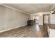 Open living room with access to the dining room and the kitchen at 10530 77Th Ter # 224, Seminole, FL 33772