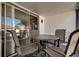 Screened in patio with dining table, seating, and indoor access at 10530 77Th Ter # 224, Seminole, FL 33772