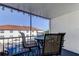 Screened patio featuring a dining table with seating and view of the complex at 10530 77Th Ter # 224, Seminole, FL 33772