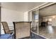The covered patio features a dining table and direct access to the house at 10530 77Th Ter # 224, Seminole, FL 33772