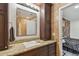 Bathroom featuring granite countertops, vanity and tiled shower at 12738 Wood Trail Blvd, Tampa, FL 33625