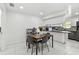 Bright dining area with modern furnishings and lots of light at 12738 Wood Trail Blvd, Tampa, FL 33625