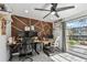 Well-lit home office with dual monitor setup and comfortable chairs at 12738 Wood Trail Blvd, Tampa, FL 33625