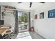 Bright office space featuring a large window, wood flooring, and clean white walls at 12738 Wood Trail Blvd, Tampa, FL 33625