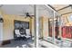 Covered patio with a ceiling fan, seating, and a view of the backyard at 12738 Wood Trail Blvd, Tampa, FL 33625