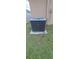 A close-up view of a Carrier air conditioner unit, ensuring efficient cooling for the home at 13052 Ogden Glade Rd, Dade City, FL 33525