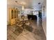 Dining room features a glass table with seating for four at 19029 Us Highway 19 N # 12E, Clearwater, FL 33764