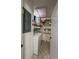 Functional laundry room with washer, dryer and ample storage at 19029 Us Highway 19 N # 12E, Clearwater, FL 33764