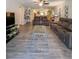 Open living room with neutral walls, wood-look floors and two sofas at 19029 Us Highway 19 N # 12E, Clearwater, FL 33764