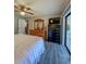Bright main bedroom with sliding door access to an outdoor living space at 19029 Us Highway 19 N # 12E, Clearwater, FL 33764