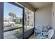 Relaxing screened porch with seating, offering a pleasant outdoor space at 2131 Ridge S Rd # 132, Largo, FL 33778