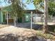Backyard features a carport and yard space at 2410 Harper St, Tampa, FL 33605