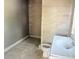 Bathroom features toilet, tiles, and sink at 2410 Harper St, Tampa, FL 33605