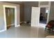 Bedroom featuring a closet and tiled flooring at 2410 Harper St, Tampa, FL 33605