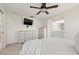 Spacious bedroom features an ensuite bathroom and natural light at 2576 Laurelwood Dr # 13C, Clearwater, FL 33763