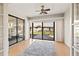 Bright sun room features sliding glass doors with access to the outside at 2576 Laurelwood Dr # 13C, Clearwater, FL 33763