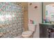 Bathroom with a shower and toilet and decor at 313 Jefferson S Ave, Oldsmar, FL 34677