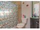 Bathroom with a shower and toilet and decor at 313 Jefferson S Ave, Oldsmar, FL 34677