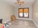 Empty bedroom with ceiling fan and wood-look flooring at 313 Jefferson S Ave, Oldsmar, FL 34677