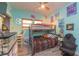 Colorful bedroom featuring a bunk bed and neutral toned wood-look flooring at 313 Jefferson S Ave, Oldsmar, FL 34677