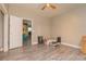 Empty bedroom with ceiling fan and wood-look flooring at 313 Jefferson S Ave, Oldsmar, FL 34677