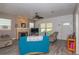 Cozy living room with neutral walls, light gray wood-look floors, and a decorative fireplace at 313 Jefferson S Ave, Oldsmar, FL 34677