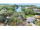 Waterfront home featuring a private dock and serene water views at 3327 Pineview Dr, Holiday, FL 34691