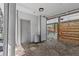 The home features a backyard with a modern horizontal wooden fence and utility door at 3327 Pineview Dr, Holiday, FL 34691